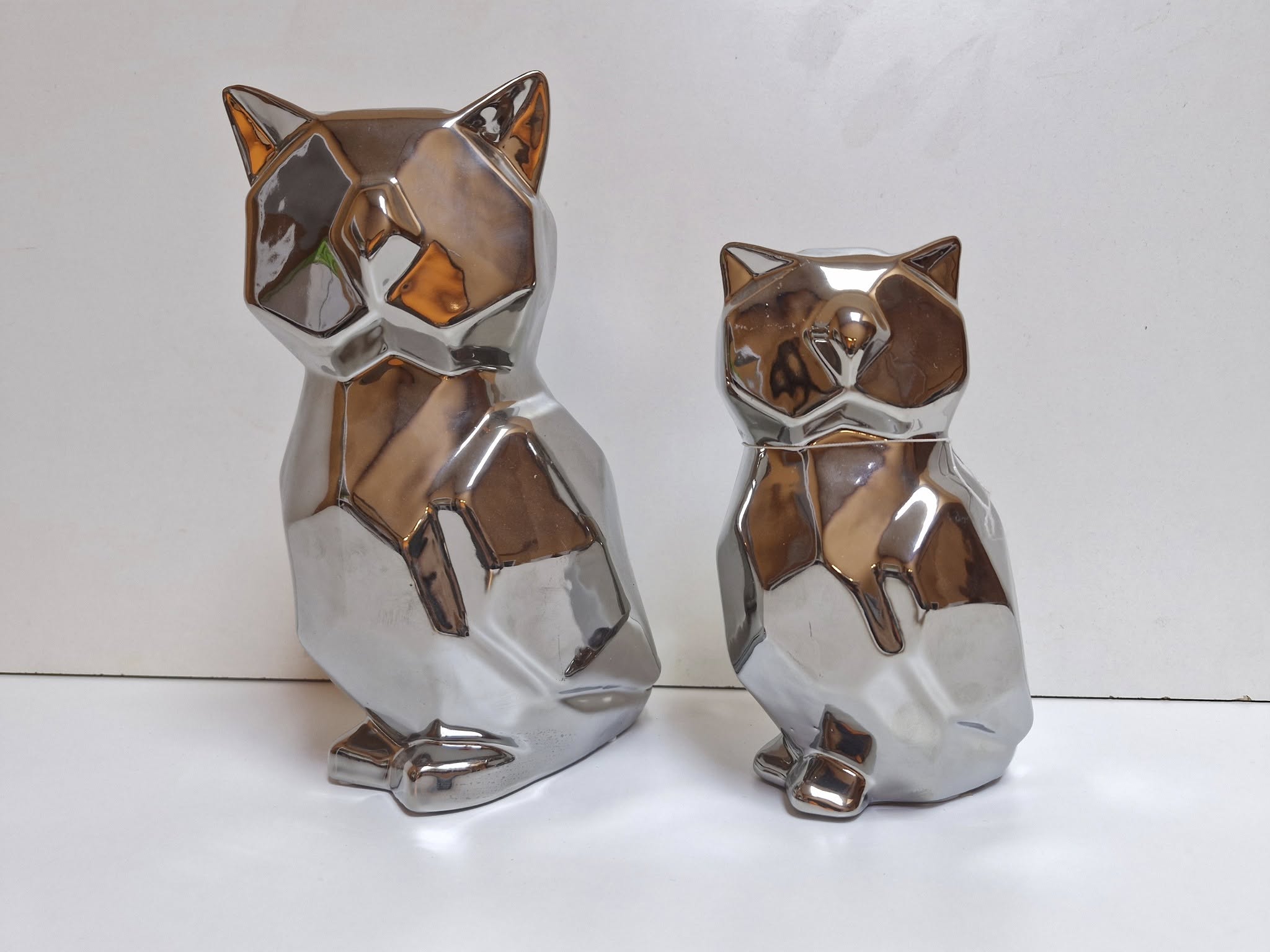 (DECORACION) X2 HUCHA FIGURA BUO (PLATEADO)